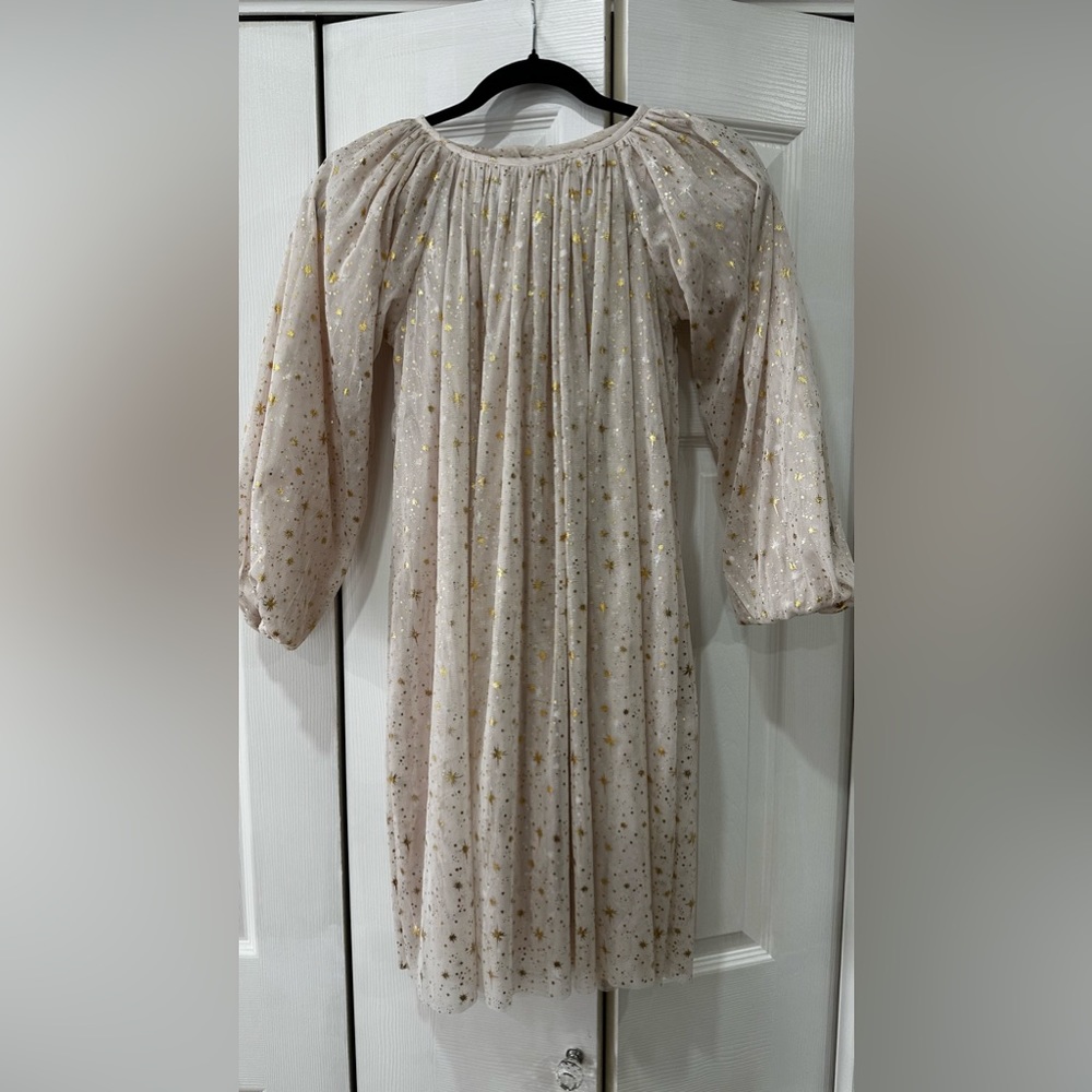Soft baby pink tulle dress with sparkly stars bought from Paris.